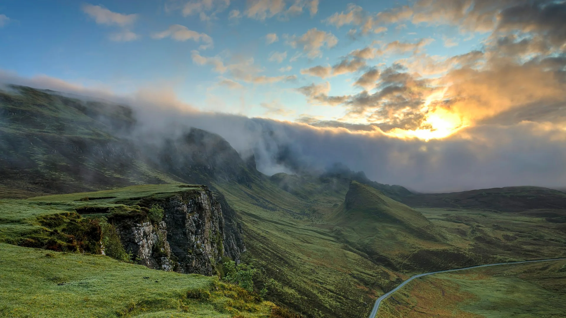 Illustrative green hills and an open horizon